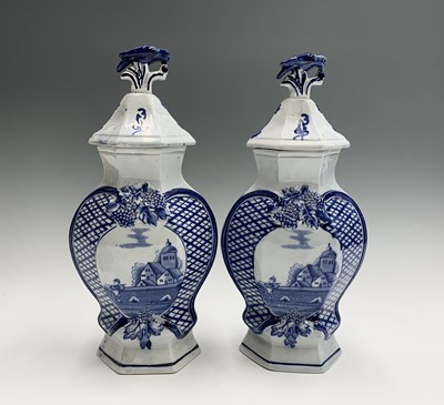 Lot 979 - A pair of Dutch Delft blue and white lidded...