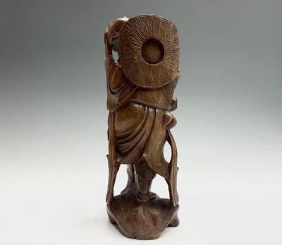 Lot 143 - A Chinese carved rootwood figure of buddha...