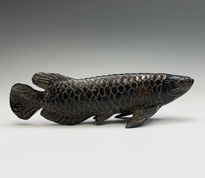 Lot 142 - A pair of Chinese bronze models of carp,...