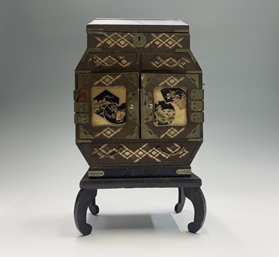 Lot 77 - A Japanese lacquered table cabinet, early 20th...