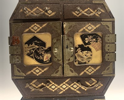 Lot 77 - A Japanese lacquered table cabinet, early 20th...