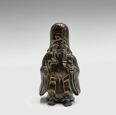 Lot 153 - A small Chinese bronze figure of a Buddha...