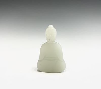 Lot 63 - A small Chinese jade figure of a seated Buddha,...