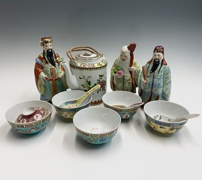 Lot 981 - Three Chinese porcelain figures of immortals,...