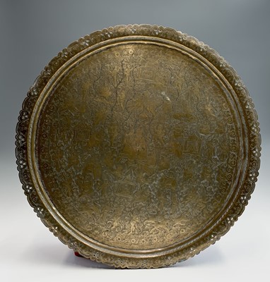 Lot 259 - A large Indian brass tray engraved with a...