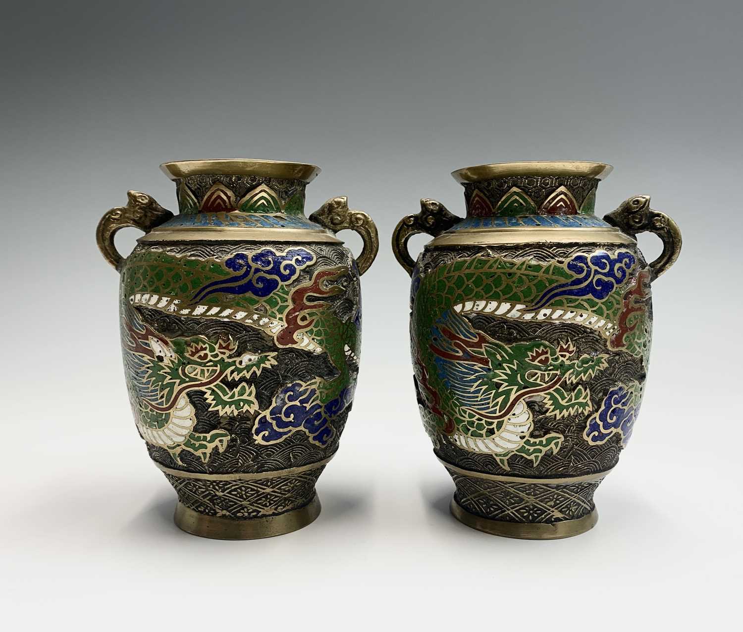Lot 162 - A pair of Japanese champleve twin handled...