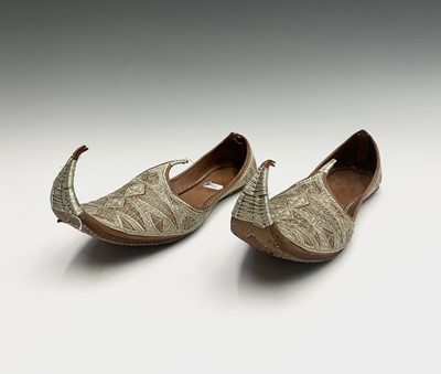 Lot 1030 - A pair of Turkish leather and silver metal...