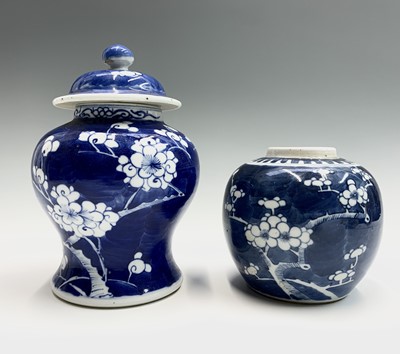 Lot 123 - A Chinese blue and white prunus blossom vase...