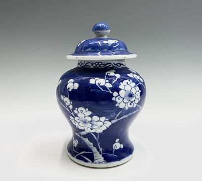 Lot 123 - A Chinese blue and white prunus blossom vase...