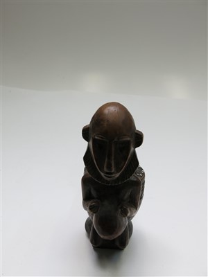 Lot 87 - An African wooden pipe, with carved figural...