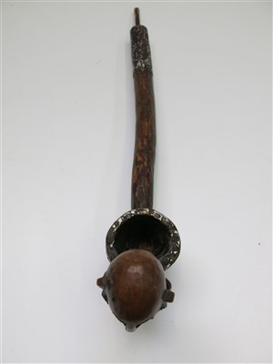 Lot 87 - An African wooden pipe, with carved figural...