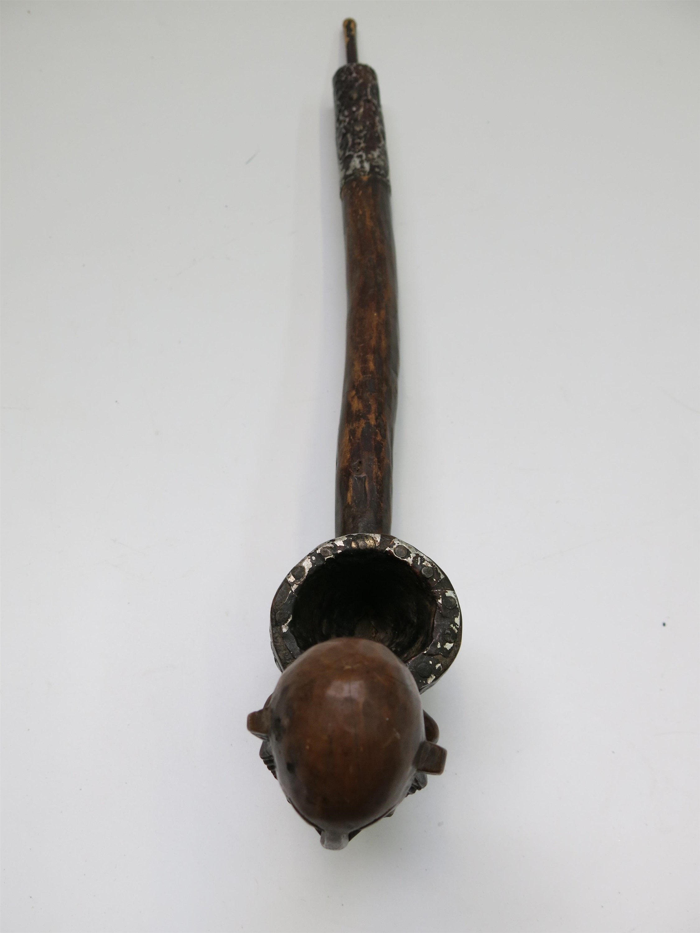 Lot 87 - An African wooden pipe, with carved figural