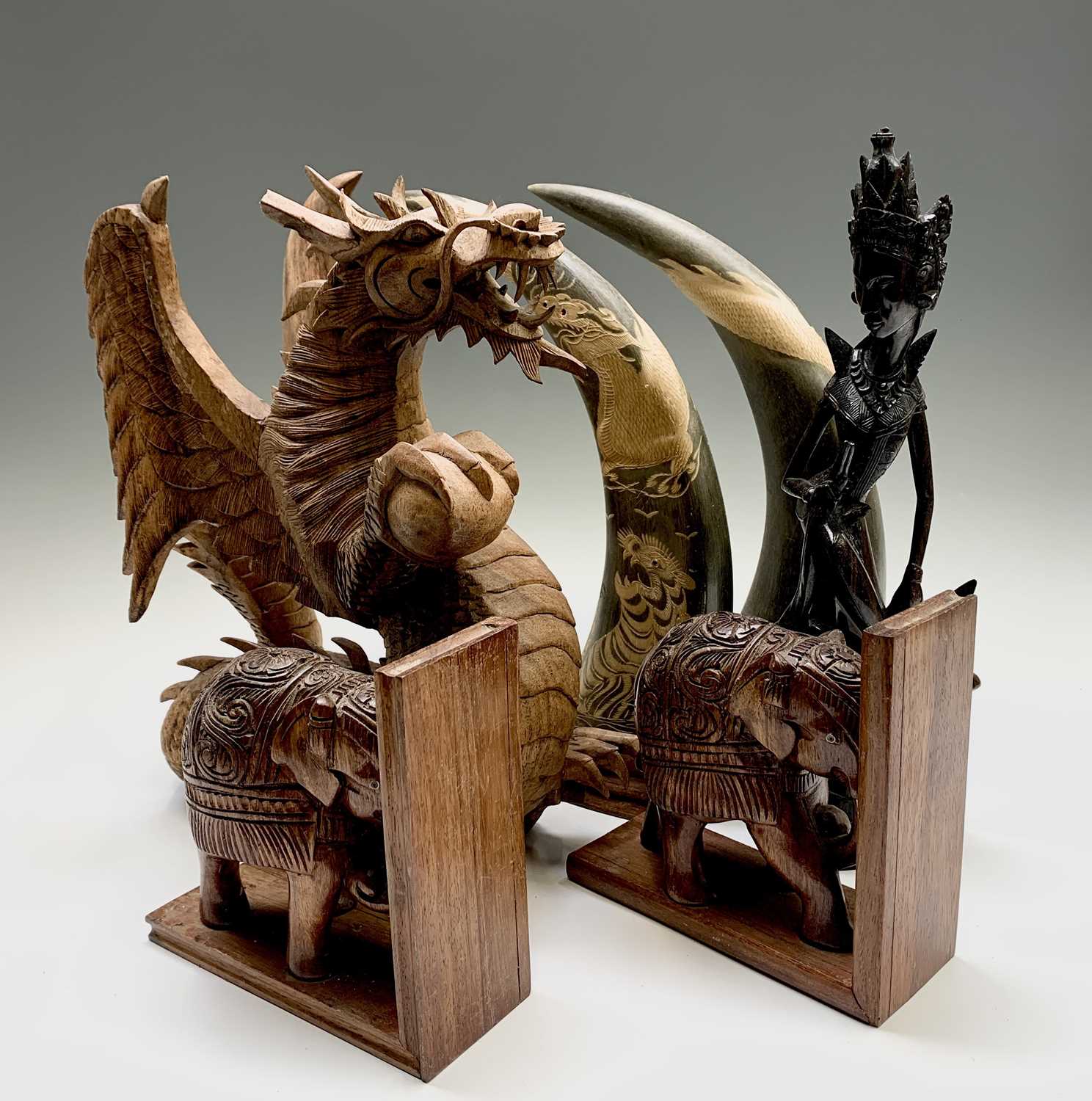 Lot 583 - An Eastern hardwood carved dragon, height 39cm,...