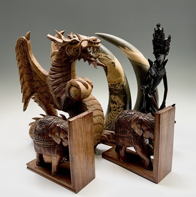 Lot 583 - An Eastern hardwood carved dragon, height 39cm,...