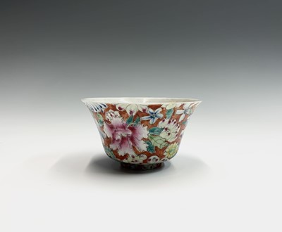 Lot 161 - A Chinese millefleur tea bowl, red six...
