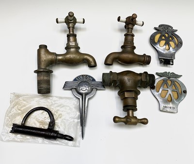 Lot 27 - Two brass Royal Doulton taps, another brass...