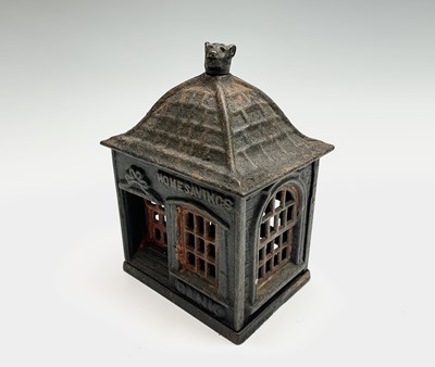 Lot 48 - An American painted cast iron 'Home Savings...