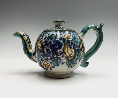 Lot 1032 - A Moroccan pottery teapot, 19th century,...