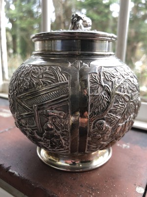 Lot 18 - A Chinese silver globular tea caddy, the body...