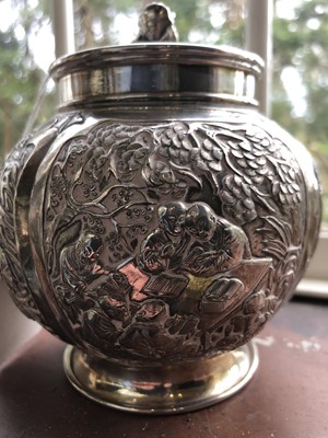 Lot 18 - A Chinese silver globular tea caddy, the body...
