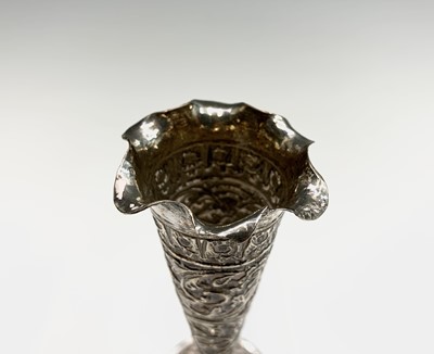 Lot 1039 - A pair of Indian silver bud vases, early 20th...