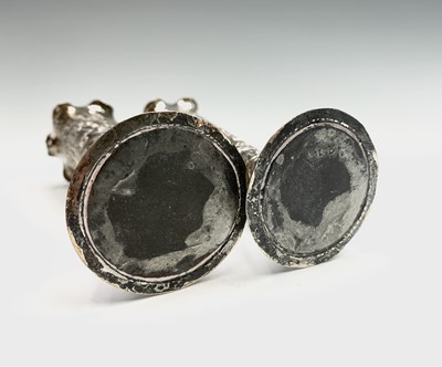 Lot 1039 - A pair of Indian silver bud vases, early 20th...