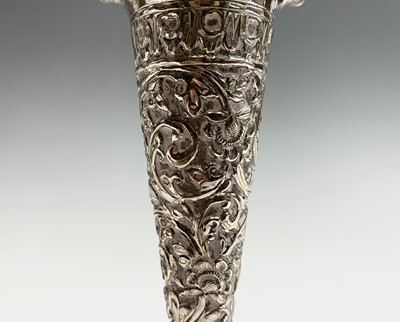 Lot 1039 - A pair of Indian silver bud vases, early 20th...