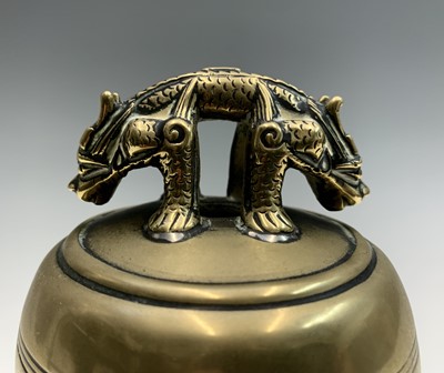 Lot 169 - A Chinese hardwood framed bronze dinner gong,...