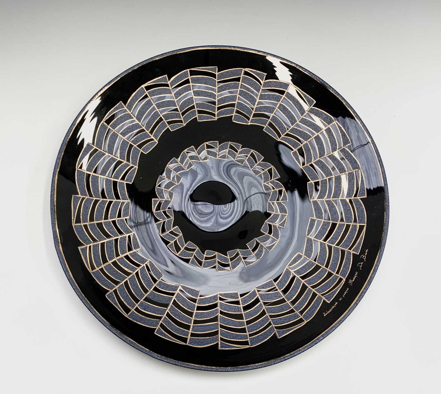 Lot 1004 A large amethyst Murano glass charger, with