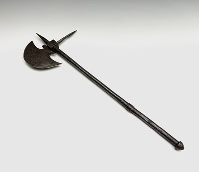 Lot 1047 - A small Indian axe, the crescent shaped blade...