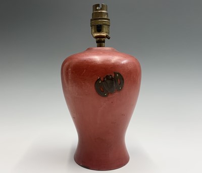 Lot 214 - A Japanese red lacquer table lamp, 20th...