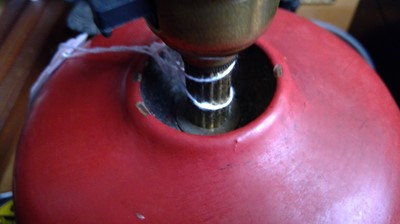 Lot 214 - A Japanese red lacquer table lamp, 20th...