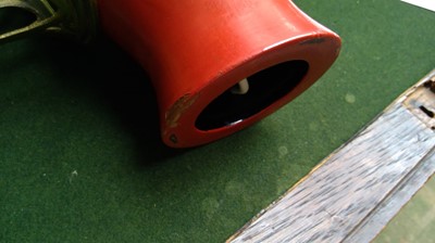 Lot 214 - A Japanese red lacquer table lamp, 20th...