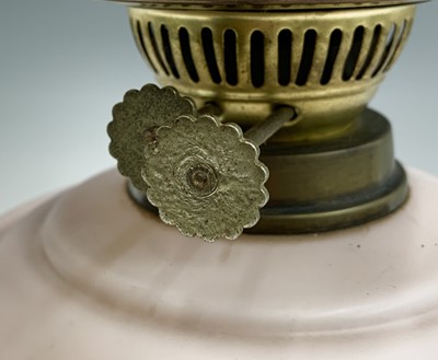 Lot 269 - A late Victorian pink opaline glass oil lamp,...