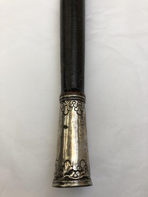 Lot 1055 - A Burmese dha sword, 19th century, the black...