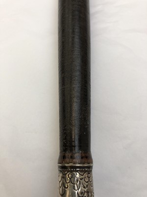 Lot 1055 - A Burmese dha sword, 19th century, the black...