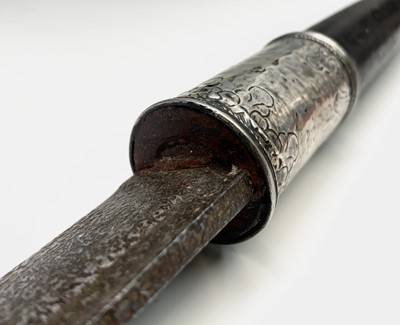 Lot 1055 - A Burmese dha sword, 19th century, the black...