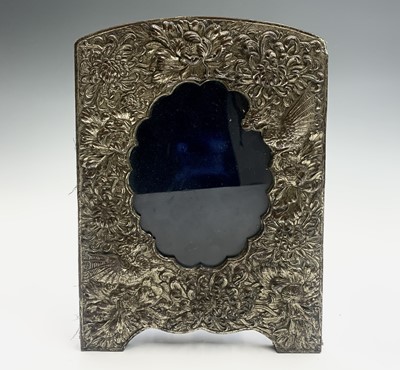 Lot 190 - A Chinese white metal photograph frame, floral...