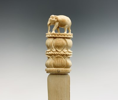 Lot 1060 - An Indian carved ivory letter opener, late...