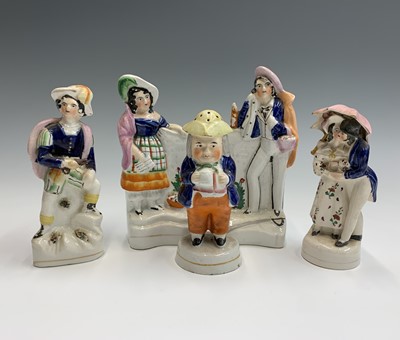 Lot 960 - A collection of Staffordshire to include a...