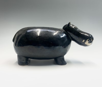 Lot 997 - A glazed pottery sculpture of a hippo. Length...