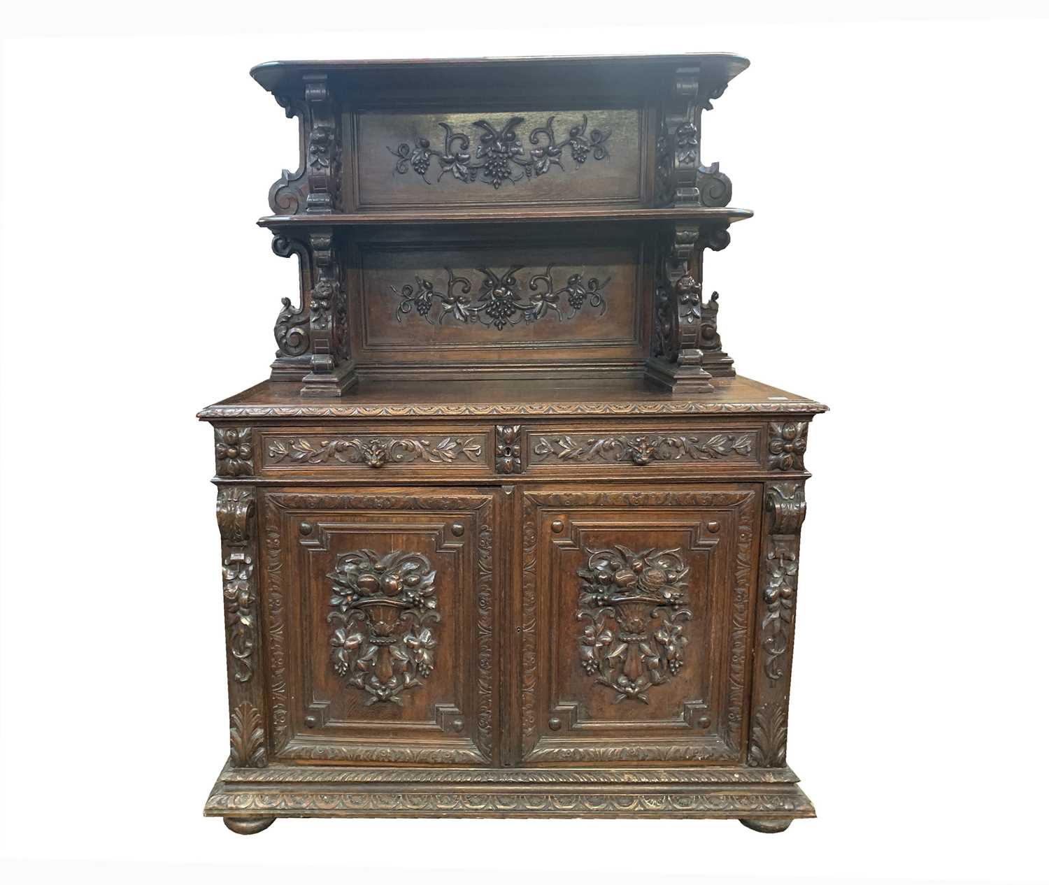 Lot 50 - A carved oak buffet, 19th century, the upper...