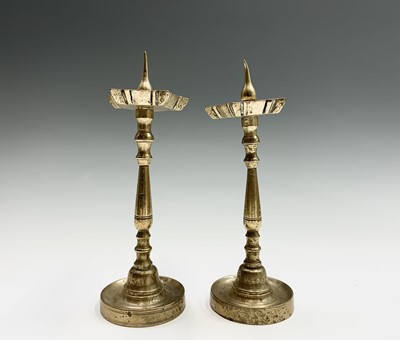 Lot 94 - A pair of 17th century style bronze pricket...