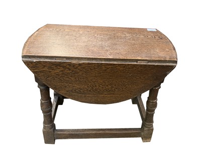 Lot 3132 - An oak drop leaf table, of small proportions,...