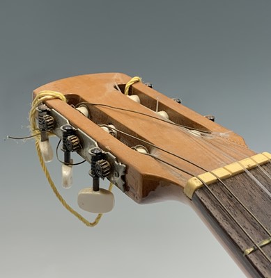 Lot 248 - A Saehan SC30 nylon stringed guitar, and a...