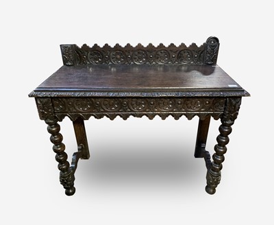 Lot 62 - A Victorian dark oak side table, with carved...