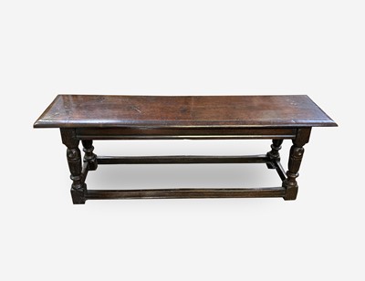 Lot 45 - A 17th century style oak long stool, the...