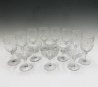 Lot 1030 - A set of eight Edwardian etched wine glasses,...