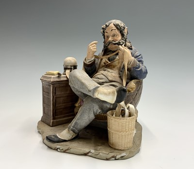 Lot 1014 - A Capodimonte style Italian porcelain figure...