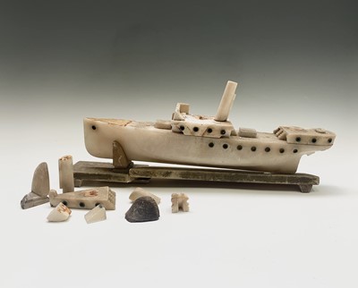 Lot 224 - An alabaster model of a steamship, on a...